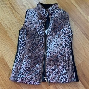 Women’s polyester vest. Lightweight. Great condition.